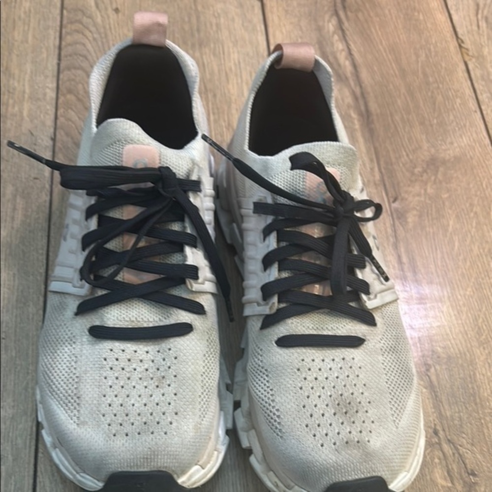 Black and Pink Sneakers with Breathable Mesh and Sleek Design